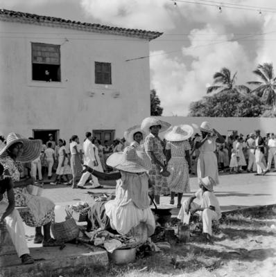 Vendedora de acarajé na procissão de Nosso Senhor dos Navegantes