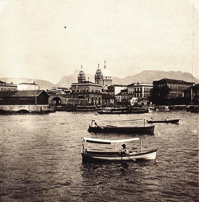 Docas e Armazéns da Alfândega; ao fundo, a Igreja da Candelária